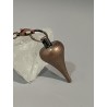 Pendule goutte allongée en laiton, couleur bronze.