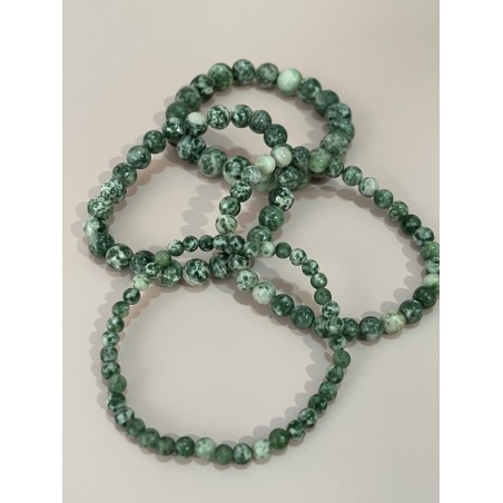Bracelet en agate arbre.
Existe en perles 4 mm, 6 mm, 8 mm et 10 mm.