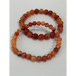Bracelet en agate de feu.
Existe en perles 6 mm et 8 mm.