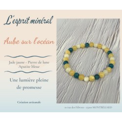 Bracelet artisanal Aube sur l’océan inspiré des couleurs de l’aube et de l’océan.
