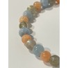 Détail des perles en aigue-marine, calcite pêche et labradorite du bracelet La Navigatrice des Tempêtes.