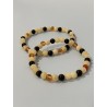 L’Orage Endormi – Bracelet en calcite orange, obsidienne noire et cornaline, existe en longueur 19 cm et 21 cm.