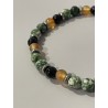 Détail des perles en agate arbre, onyx et cornaline du bracelet Le Fruit de l’Effort.