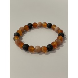 L’Héritier du Dragon – Bracelet en lave, cornaline et pierre de soleil naturelle, aux nuances de noir, orange et doré.