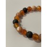 Détail des perles en lave, cornaline et pierre de soleil naturelle du bracelet L’Héritier du Dragon.