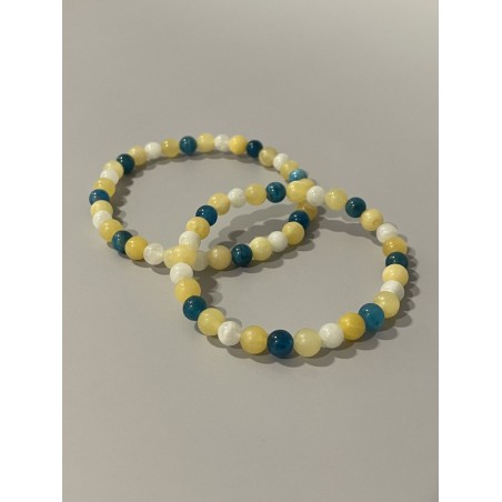 Bracelet La Clé des Étoiles en jade jaune, pierre de lune et apatite bleue – existe en 19 cm et 21 cm de longueur.