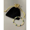 Le bracelet La Clé des Étoiles et son écrin.